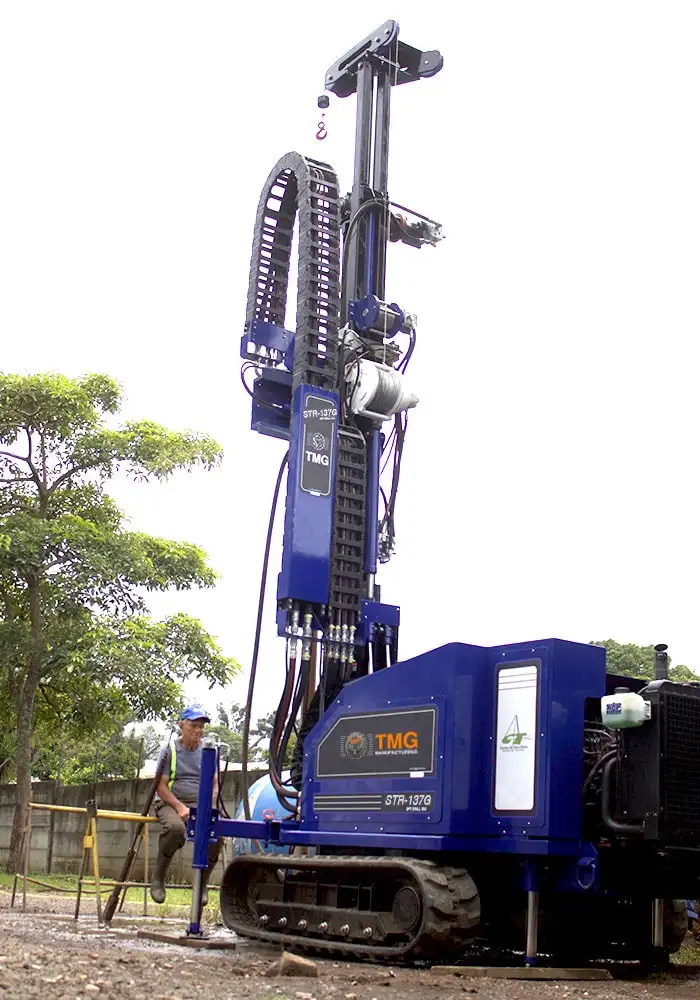 Picture of our STR-137G a soil test drill rig for SPT and wireline rotary core drilling. This drilling rig can take soil samples and can also do wireline coring and rotary drilling.